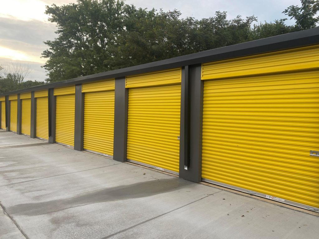Krakow Storage Washington Missouri showing yellow doors, clean, paved drives, and and new